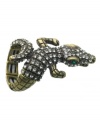 Call it animal attraction. This chic alligator cocktail ring by GUESS is the must-have of the season. Crafted in oxidized brass tone mixed metal with sparkling crystal accents and green crystal eyes. Rings stretches to fit finger.