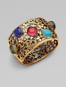 This colorful piece features resin cabochons and rhinestone details set on a delicate filigree design. Resin stonesGlass stonesBrass and pewterDiameter, about 2½Hinged magnetic closureMade in USA