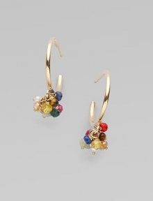 Simple hoops of 14k gold dangle colorful clusters of tiny gemstone beads.Emerald, sapphire, ruby, diamond, tiger's eye, hessonite, cultured pearl and coral 14k yellow gold Diameter, about ¾ Post back Imported Simple hoops of 14k gold dangle colorful clusters of tiny gemstone beads.Emerald, sapphire, ruby, diamond, tiger's eye, hessonite, cultured pearl and coral 14k yellow gold Diameter, about ¾ Post back Imported