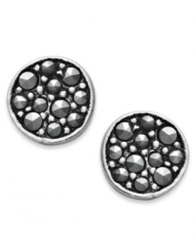 Punch up your look with a ton of sparkle. Studio Silver's pretty stud earrings feature a sterling silver setting with round-cut marcasite at the center. Approximate diameter: 2-1/2 inches. Punch up your look with a ton of sparkle. Studio Silver's pretty stud earrings feature a sterling silver setting with round-cut marcasite at the center. Approximate diameter: 2-1/2 inches.
