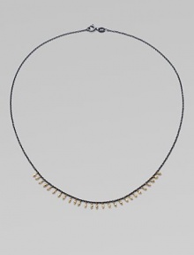 A delicate design with 14k gold beads on oxidized sterling silver chain. 14k gold beadsOxidized sterling silverLength, about 16Spring ring closureMade in USA A delicate design with 14k gold beads on oxidized sterling silver chain. 14k gold beadsOxidized sterling silverLength, about 16Spring ring closureMade in USA