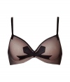 Stylish underwire bra in fine nylon stretch blend - Elegant in classic black and nude from French lingerie maven Chantal Thomass - Tulle overlay and ultra-feminine bow detail - 3/4 cups offer nearly full coverage - Slim straps and satin trim - Creates a flattering silhouette, a perfect mix of sweet and sexy - Wear under just about anything