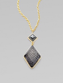 This sleek, long 14k goldplated chain dangles an eye-catching diamond shaped pendant. 14k goldplated white metal alloy Length, about 18 Resin covered water snakeskin Pendant size, about 2¼ Lobster clasp closure Made in USA This sleek, long 14k goldplated chain dangles an eye-catching diamond shaped pendant. 14k goldplated white metal alloy Length, about 18 Resin covered water snakeskin Pendant size, about 2¼ Lobster clasp closure Made in USA