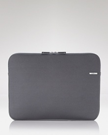 With its tough, form-fitting neoprene construction and faux fur interior, this handsome case fits your 15 laptop like a glove. With its tough, form-fitting neoprene construction and faux fur interior, this handsome case fits your 15 laptop like a glove.