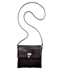 Simple and classic, this take-anywhere silhouette from Calvin Klein is crafted in sumptuous leather with discrete signature hardware. A secure front flap closure and compact crossbody design make it a must-have for weekends, errands, travel, and more. Simple and classic, this take-anywhere silhouette from Calvin Klein is crafted in sumptuous leather with discrete signature hardware. A secure front flap closure and compact crossbody design make it a must-have for weekends, errands, travel, and more.