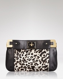A subtly sized statement piece, this Milly clutch in texture calf hair will ensure that every aspect of your on-the-town look is wildly polished. A subtly sized statement piece, this Milly clutch in texture calf hair will ensure that every aspect of your on-the-town look is wildly polished.