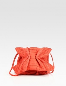 Sueded python defines this demure, cinched-front bagShoulder strap, 29 dropMagnetic flap closureSuede lining5W X 5H X 2DMade in USA Sueded python defines this demure, cinched-front bagShoulder strap, 29 dropMagnetic flap closureSuede lining5W X 5H X 2DMade in USA