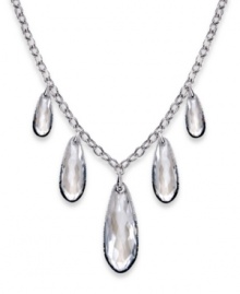 Graceful and gorgeous. With five dangling clear Swarovski crystals in an exclusive cut and embellished by gradated crystal Pointiage, Swarovski's Perfection necklace lives up to its name. Set in silver tone mixed metal. Approximate length: 16 inches. Approximate drop: 2-1/2 inches.