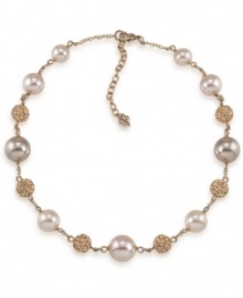 Elegance at its best. Carolee's beautiful illusion necklace combines glass pearls and crystal fireballs in 12k gold-plated mixed metal. Approximate length: 16 inches + 2-inch extender.