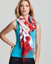 A vibrantly refreshing floral printed scarf with twisted fringe edge for a stylish touch.