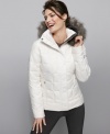 Ideal for a day of slope side fun, Columbia's quilted jacket keeps you toasty in high style with a faux fur hood. (Clearance)