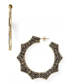 Belle Noel channels gypsy glamor with this pair of plated hoop earrings, cast in yellow gold with ornate engravings. It's a statement style for the Boho trope.