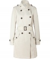 This edgy-cool trench brings a modern approach to a classic wardrobe staple - Double-breasted cut, epaulets, belted waist, flap pockets, back slit - Style with high-waisted skinny jeans, a bright sweater, and wedge booties