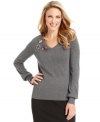 Charter Club dresses up this sleek petite sweater with brilliant brooch-like beading at the shoulder.