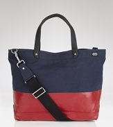 This durable, downtown tote is perfect for everyday use with its modern color block design and reinforced material.
