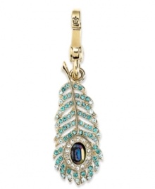 Walk proud with this peacock feather-styled charm from Juicy Couture. Crafted from gold tone brass with glistening glass accents and round cubic zirconia (1 ct. t.w.), the charm offers a whimsical fashion approach. Approximate drop: 2 inches.