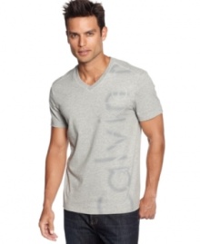 A v-neck paired with a Calvin Klein logo graphic give this tee a classic style.