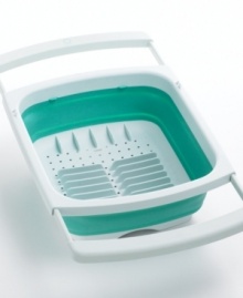 This dish rack dries your dishes, folds flat and disappears! It barely takes up any space under your sink or anywhere else in the kitchen, yet expands to hold up to eight plates. It even extends over the sink for minimal cleanup. Limited lifetime warranty. This dish rack dries your dishes, folds flat and disappears! It barely takes up any space under your sink or anywhere else in the kitchen, yet expands to hold up to eight plates. It even extends over the sink for minimal cleanup. Limited lifetime warranty.