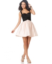 Fun, fresh and flirty: JS Collection combines a sexy fitted bodice with a flared skirt for a fashion-forward look.