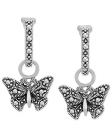 Soar to new heights of style. These drop earrings from Genevieve & Grace are set in sterling silver with marcasite adding luster to the butterfly motif. Approximate drop length: 1 inch. Approximate drop width: 1/2 inch. Soar to new heights of style. These drop earrings from Genevieve & Grace are set in sterling silver with marcasite adding luster to the butterfly motif. Approximate drop length: 1 inch. Approximate drop width: 1/2 inch.