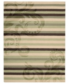 Geometric chic. Enhance your living area with the beautiful look and sheen of Nourison's Elements rug. Hand-loomed of plush wool for incredible texture, the luminous rug features an oversized ring motif across a soft beige background. Geometric chic. Enhance your living area with the beautiful look and sheen of Nourison's Elements rug. Hand-loomed of plush wool for incredible texture, the luminous rug features an oversized ring motif across a soft beige background.