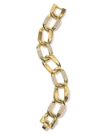 Add classic glamour with Carolee's commanding gold-plated bracelet. Wear this glittering piece to accent a nautical-inspired palette of red, navy and gold.