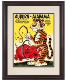 Augie failed to tame the Crimson Tide in 1959, but the game day program cover still makes fantastic artwork for die-hard Auburn football fans. A classic cherry-colored frame and double mat make this vivid reproduction ready for display. Augie failed to tame the Crimson Tide in 1959, but the game day program cover still makes fantastic artwork for die-hard Auburn football fans. A classic cherry-colored frame and double mat make this vivid reproduction ready for display.