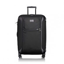 True to Tumi's heritage of innovation and the future of advanced travel design, this lightweight 4-wheel case combines hardside protection with our modern, iconic ballistic nylon aesthetics. Significantly lighter than traditional wheeled cases, this packing case offers the easy maneuverability of four 360° spinner wheels, all-around bumper guards, impressive impact resistance, Tumi's patented impact-resistant X-Brace™ handle system and smooth, durable ballistic nylon fabric covering a strong and flexible polypropylene shell. The exterior features convenient zip pockets and the interior includes accessory pockets, tie-down straps and a removable garment sleeve. True to Tumi's heritage of innovation and the future of advanced travel design, this lightweight 4-wheel case combines hardside protection with our modern, iconic ballistic nylon aesthetics. Significantly lighter than traditional wheeled cases, this packing case offers the easy maneuverability of four 360° spinner wheels, all-around bumper guards, impressive impact resistance, Tumi's patented impact-resistant X-Brace™ handle system and smooth, durable ballistic nylon fabric covering a strong and flexible polypropylene shell. The exterior features convenient zip pockets and the interior includes accessory pockets, tie-down straps and a removable garment sleeve.