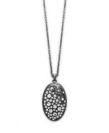 This style will have you seeing stars. Eliot Danori's petite Star Struck pendant adds a look of instant glamour. Crafted in anthracite tone mixed metal with sparkling crystal accents. Approximate length: 16 inches + 2-inch extender. Approximate drop: 1 inch. This style will have you seeing stars. Eliot Danori's petite Star Struck pendant adds a look of instant glamour. Crafted in anthracite tone mixed metal with sparkling crystal accents. Approximate length: 16 inches + 2-inch extender. Approximate drop: 1 inch.