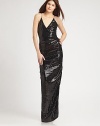 Glitzy and glamorous, in an allover sequined, floor-length silhouette.Spaghetti strapsSurplice necklineSide slitRacerbackAbout 44 from natural waist95% rayon/5% spandexSpot cleanImportedModel shown is 5'10 (177cm) wearing US size 4. 