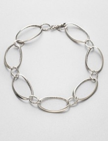 From the Kali Collection. Large and small links, some textured inside, some textured outside, all textured with the distinctive paving-stone Kali pattern.Sterling silverLength, about 19Toggle closureMade in Bali From the Kali Collection. Large and small links, some textured inside, some textured outside, all textured with the distinctive paving-stone Kali pattern.Sterling silverLength, about 19Toggle closureMade in Bali