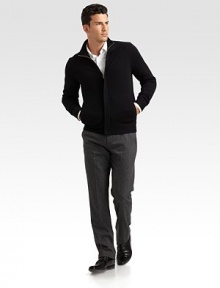 A new cold-weather classic is shaped from extra-fine wool yarns with a covered zip placket and stand collar. Side pockets Wool Dry clean Imported A new cold-weather classic is shaped from extra-fine wool yarns with a covered zip placket and stand collar. Side pockets Wool Dry clean Imported