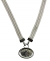 A statement-making piece that's sleek and versatile. AK Anne Klein pendant highlights an oval-cut sunburst strung from multiple rows of woven chains. Crafted in silver tone mixed metal. Approximate length: 16 inches. Approximate drop: 1-1/4 inches.