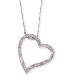 Keep your heart open to love with this gorgeous pendant from Swarovski. Light-reflecting crystal pave covers a sweeping heart set in rhodium-plated mixed metal. Approximate length: 15-1/2 inches. Approximate drop: 1 inch. Keep your heart open to love with this gorgeous pendant from Swarovski. Light-reflecting crystal pave covers a sweeping heart set in rhodium-plated mixed metal. Approximate length: 15-1/2 inches. Approximate drop: 1 inch.