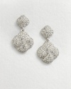 An exquisite knot motif encrusted in pavé crystals. CrystalsRhodium-plated brassLength, about .87Post backImported 