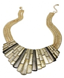 Dress like an Egyptian. This regal necklace from Alfani commands attention with a bib accent with subtle hematite hues. Strung from a multi-chain with closure. Crafted in gold tone mixed metal. Approximate length: 18 inches + 3-inch extender. Approximate drop: 2-3/4 inches. Dress like an Egyptian. This regal necklace from Alfani commands attention with a bib accent with subtle hematite hues. Strung from a multi-chain with closure. Crafted in gold tone mixed metal. Approximate length: 18 inches + 3-inch extender. Approximate drop: 2-3/4 inches.