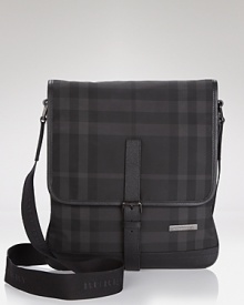 A sleek hold-all features Burberry's signature check pattern for an iconic addition to your everyday look. Excellent organization pockets provide easy access to your phone, laptop and other essentials. A sleek hold-all features Burberry's signature check pattern for an iconic addition to your everyday look. Excellent organization pockets provide easy access to your phone, laptop and other essentials.