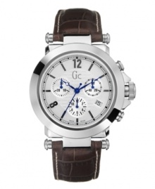 Tough enough for the outdoors, sleek enough for the office. This handsome watch by Gc Swiss Made Timepieces has everything you need, and then some. Brown leather croc-embossed strap and round stainless steel case. Textured silvertone dial features numerals at twelve and eight o'clock, stick indices, date window at four o'clock, three chronograph subdials, vibrant blue hands and logo. Swiss movement. Water resistant to 100 meters. Ten-year limited warranty. Luxury Gc gift box packaging included. Tough enough for the outdoors, sleek enough for the office. This handsome watch by Gc Swiss Made Timepieces has everything you need, and then some. Brown leather croc-embossed strap and round stainless steel case. Textured silvertone dial features numerals at twelve and eight o'clock, stick indices, date window at four o'clock, three chronograph subdials, vibrant blue hands and logo. Swiss movement. Water resistant to 100 meters. Ten-year limited warranty. Luxury Gc gift box packaging included.
