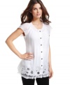 Alfani creates a light and airy look perfect for the warmer months with this petite tunic. Pair it with skinny jeans or leggings for a trendy silhouette.