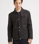 Featuring a classic plaid and signature Alexander Wang tailoring, a brilliant three-pocket jacket.Button frontDropped shouldersButtoned cuffsFront pocketsFully linedAbout 27 from shoulder to hem80% wool/10% polyester/10% nylonDry cleanImported