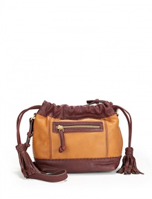 THE LOOKColorblock designCrossbody strap with stitch detailsMagnetic top closure with side drawstrings and tassel endsOne outside zip pocketOne inside zip pocketInside logo detailTHE MEASUREMENTCrossbody strap, 18 drop10W X 8H X 4DTHE MATERIALLeatherLogo printed liningORIGINImported THE LOOKColorblock designCrossbody strap with stitch detailsMagnetic top closure with side drawstrings and tassel endsOne outside zip pocketOne inside zip pocketInside logo detailTHE MEASUREMENTCrossbody strap, 18 drop10W X 8H X 4DTHE MATERIALLeatherLogo printed liningORIGINImported