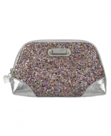 Get your glam on with this shimmery sequin cosmetic case from Nine West. Petite and poised to stash all your beauty must-haves, it easily slips into almost any handbag for on the go touch-ups anytime. Get your glam on with this shimmery sequin cosmetic case from Nine West. Petite and poised to stash all your beauty must-haves, it easily slips into almost any handbag for on the go touch-ups anytime.