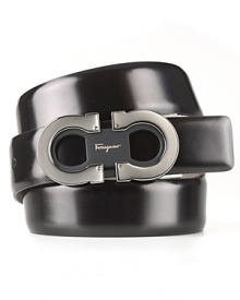 A handsome belt with a double Gancini logo makes a strong contribution to your professional wardrobe. A handsome belt with a double Gancini logo makes a strong contribution to your professional wardrobe.