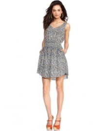 Open-back details add eye-catching appeal to this BCBGeneration printed dress -- perfect for a flirty day-to-night look!