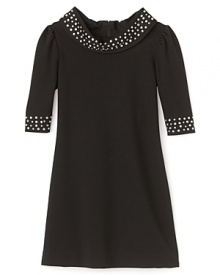 Vintage-chic gets the royal treatment with this Nicole Miller dress featuring sparkling rhinestones at the neck and cuffs. Vintage-chic gets the royal treatment with this Nicole Miller dress featuring sparkling rhinestones at the neck and cuffs.