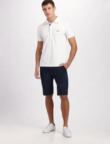The perfect look for the perfect weekend, handsomely crafted with a super-smooth hand in a stretch jersey knit. Four-button placket Embroidered logo 56% cotton/39% polyester/5% elastane Machine wash Imported The perfect look for the perfect weekend, handsomely crafted with a super-smooth hand in a stretch jersey knit. Four-button placket Embroidered logo 56% cotton/39% polyester/5% elastane Machine wash Imported
