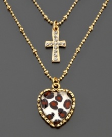 A twist on traditional. A textured goldtone cross pendant and heart-shaped leopard pendant dangle on a delicate double-layered chain. Length measures 16 inches; drop measures 1 inch. A twist on traditional. A textured goldtone cross pendant and heart-shaped leopard pendant dangle on a delicate double-layered chain. Length measures 16 inches; drop measures 1 inch.