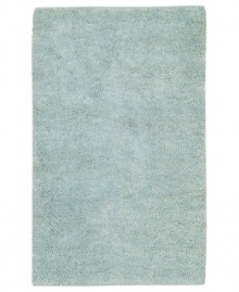 Bring a sensation of serenity to any room with a rich, felted wool rug in soothing spa blue. Hand-woven in India, this luxurious piece lets you in indulge in the supreme softness of plush New Zealand wool. Bring a sensation of serenity to any room with a rich, felted wool rug in soothing spa blue. Hand-woven in India, this luxurious piece lets you in indulge in the supreme softness of plush New Zealand wool.