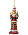 Jim Shore cracks the code on Christmas with an ornament that combines two holiday classics – St. Nick and a nutcracker! Featuring an ornately carved and patterned coat, star-topped staff and tiny tree.