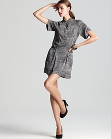 Update the menswear trend in a DIANE von FURSTENBERG shirt dress, touting cuffed short sleeves, a buckle-cinched waist and a femme pleated skirt. Update the menswear trend in a DIANE von FURSTENBERG shirt dress, touting cuffed short sleeves, a buckle-cinched waist and a femme pleated skirt.